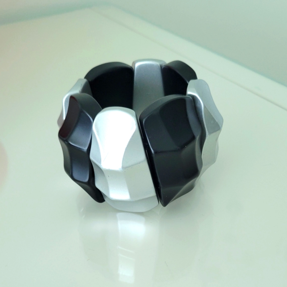 Black and silver bold stretch bracelet.